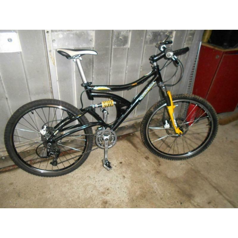 VTT 26" Rockrider 24 vit,full alu,full susp,full frein hydr,